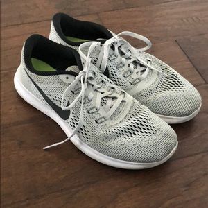 Nike light grey free run tennis shoes